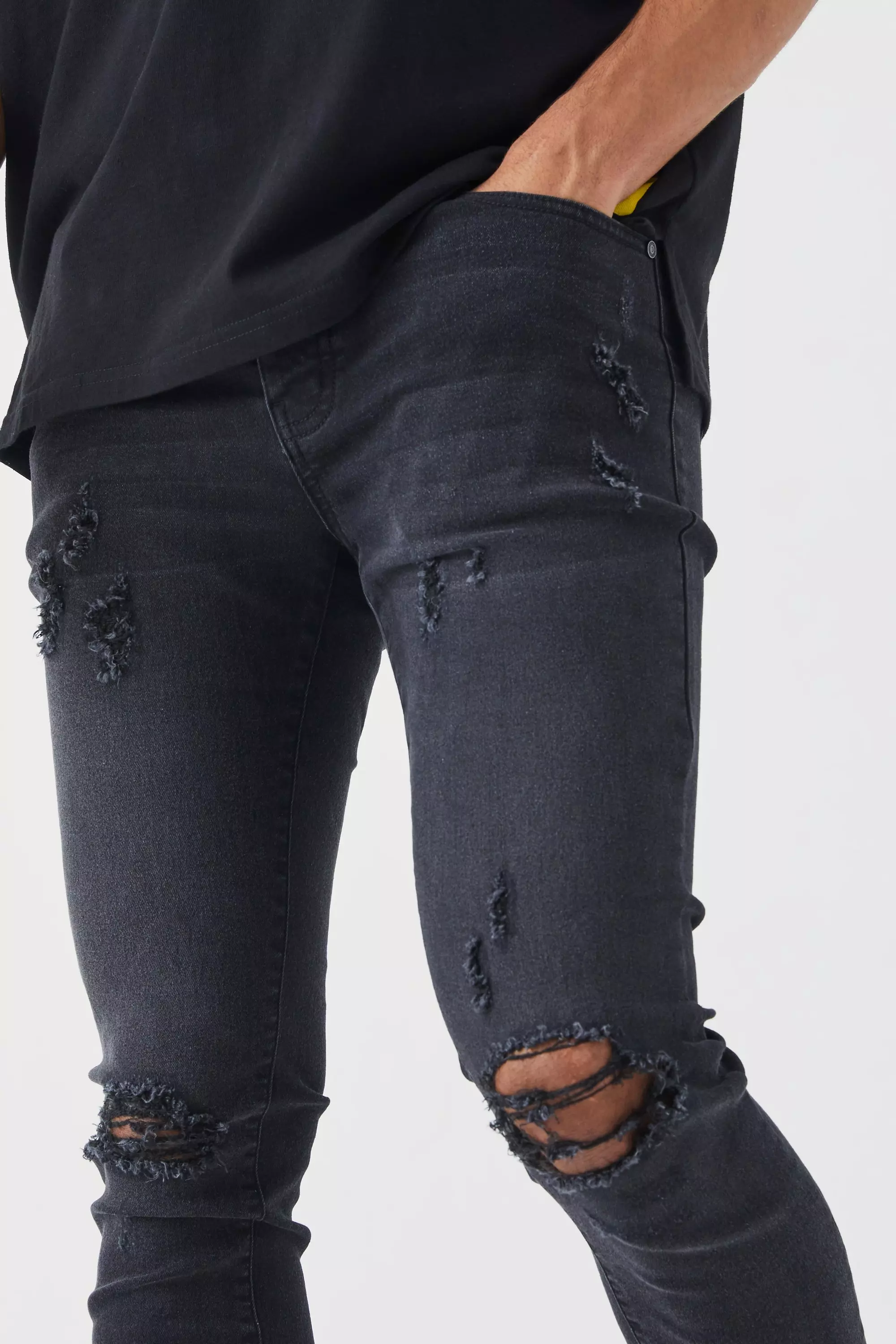 Mens jeans store with knee rips